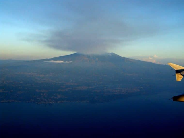 Snow-covered Etna above the clouds